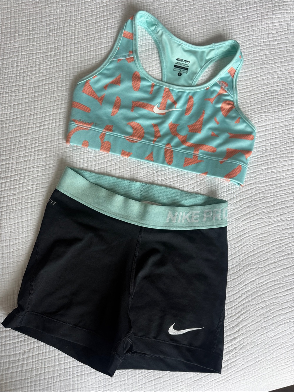 Nike Aqua & Coral Printed Sports Bra and Black Nike Pro Shorts